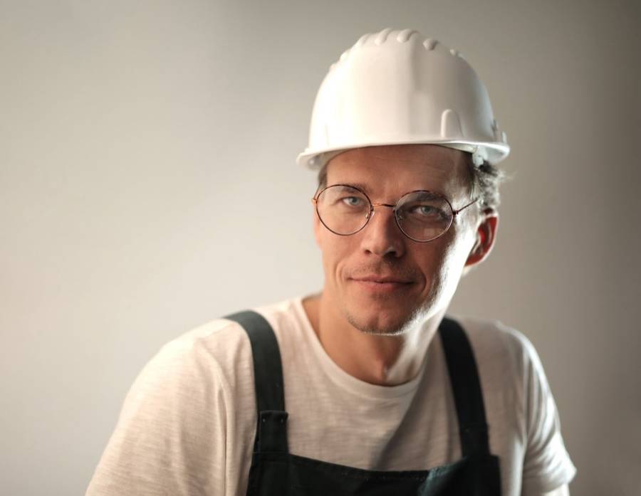 Smiling contractor in a hard hat